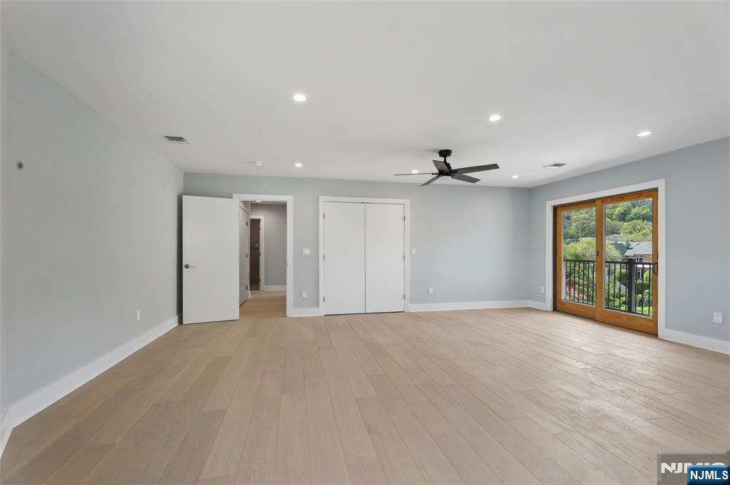 1225 River Road, Unit 4D Edgewater, NJ 07020 - Photo 28 of 47 a view of an empty room with a window