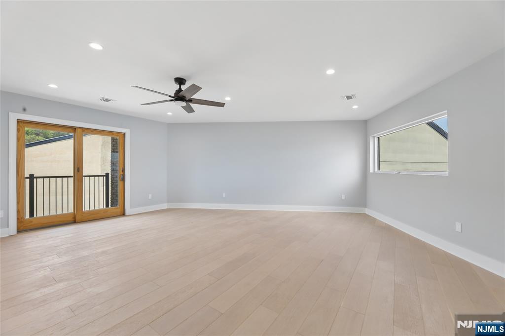 1225 River Road, Unit 4D Edgewater, NJ 07020 - Photo 30 of 47 a view of an empty room with a window