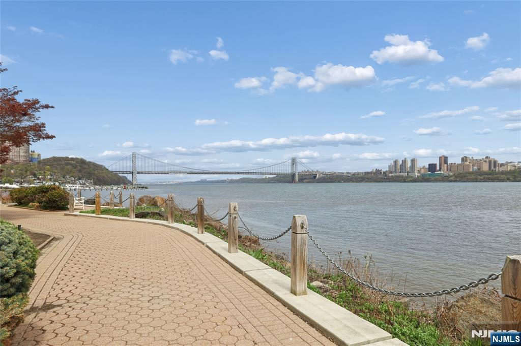 1225 River Road, Unit 4D Edgewater, NJ 07020 - Photo 4 of 47 a view of a lake and outdoor space