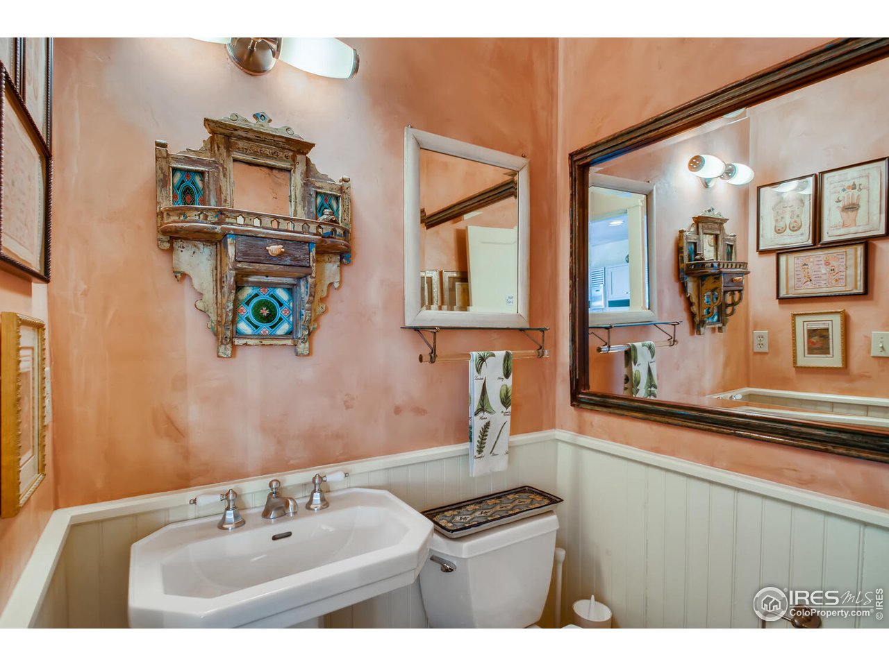 2123 4th Street Boulder, CO 80302 - Photo 14 of 40 a bathroom with a sink and a mirror