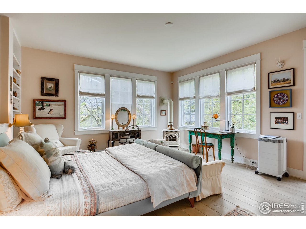 2123 4th Street Boulder, CO 80302 - Photo 19 of 40 a bed room with two bed and a large window