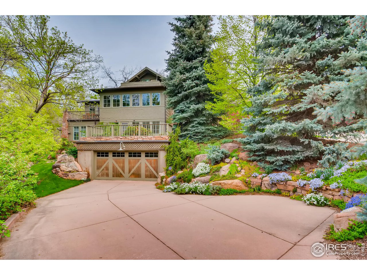 2123 4th Street Boulder, CO 80302 - Photo 2 of 40 a view of house with outdoor space and sitting area