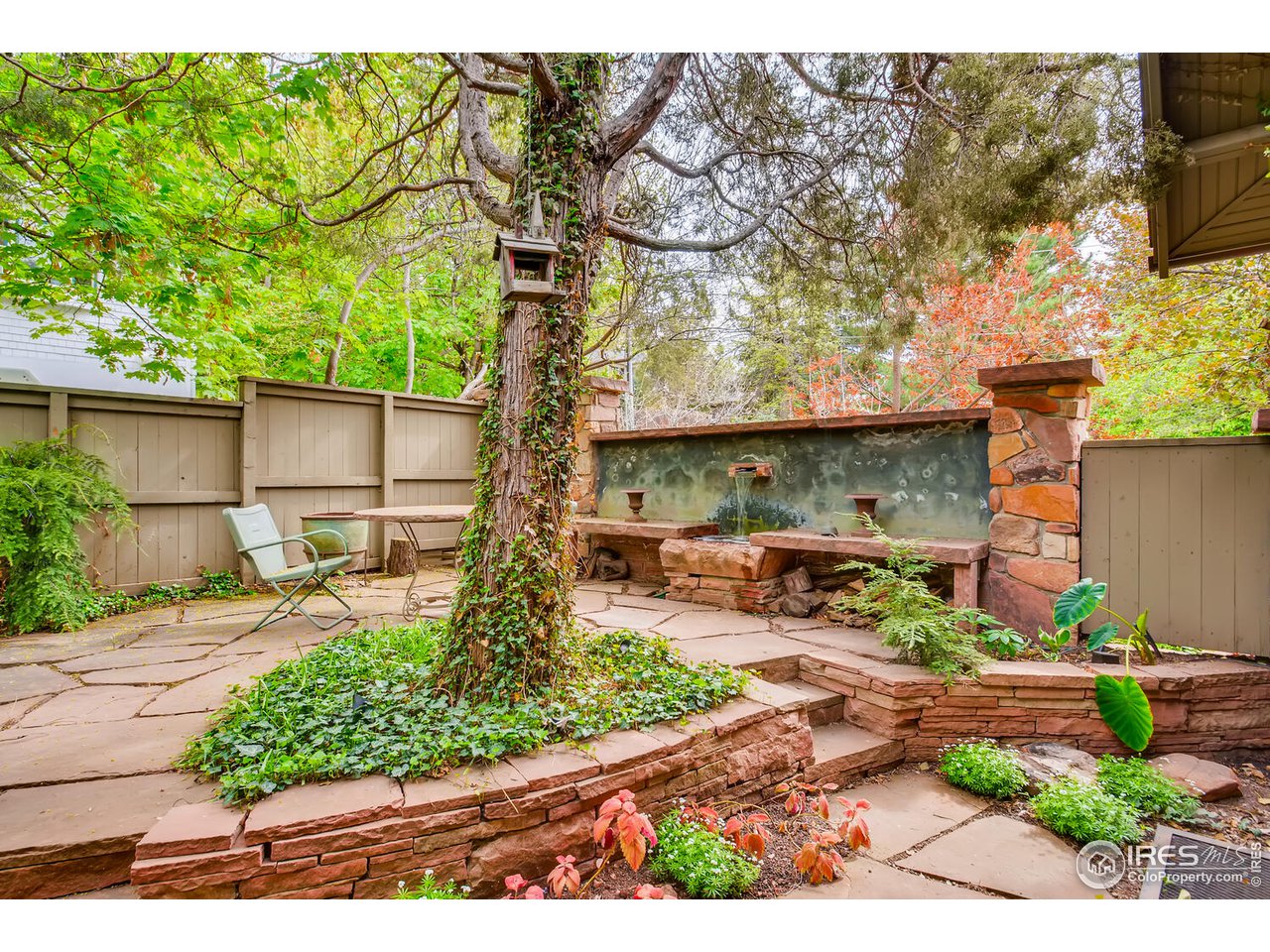 2123 4th Street Boulder, CO 80302 - Photo 4 of 40 a front view of a house with garden
