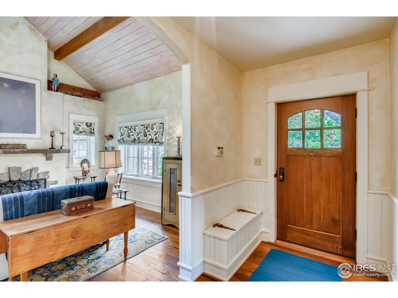 2123 4th Street Boulder, CO 80302 - Photo 5 of 40 a living room with furniture and a wooden floor