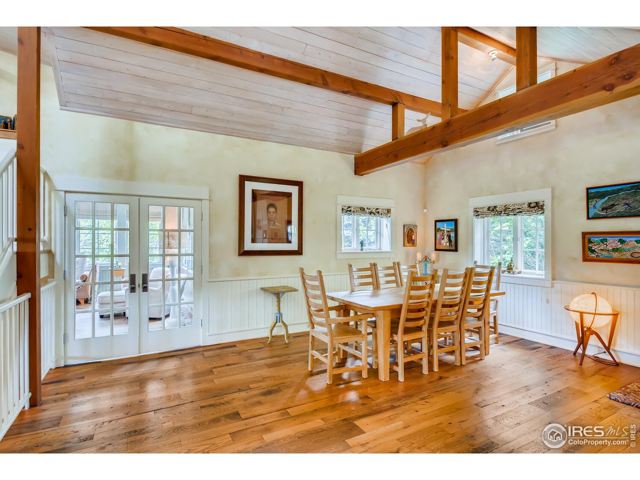 2123 4th Street Boulder, CO 80302 - Photo 7 of 40 a view of a dining room with furniture and wooden floor