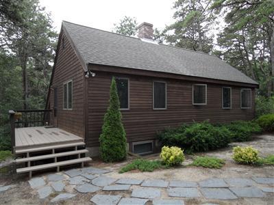 160 Old Long Pond Road Wellfleet, MA 02667 - Photo 1 of 18 a front view of a house with garden