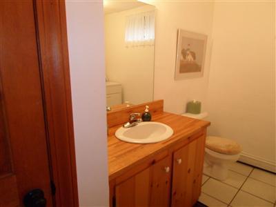 160 Old Long Pond Road Wellfleet, MA 02667 - Photo 13 of 18 a bathroom with a sink and a mirror