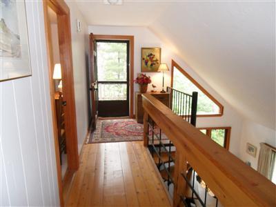 160 Old Long Pond Road Wellfleet, MA 02667 - Photo 18 of 18 a view of entryway and hall with wooden floor