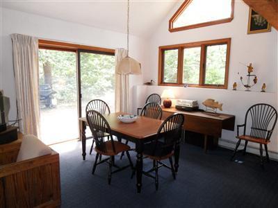 160 Old Long Pond Road Wellfleet, MA 02667 - Photo 2 of 18 a view of a dining room with furniture window and outside view