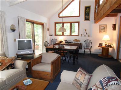 160 Old Long Pond Road Wellfleet, MA 02667 - Photo 3 of 18 a living room with furniture and a large window