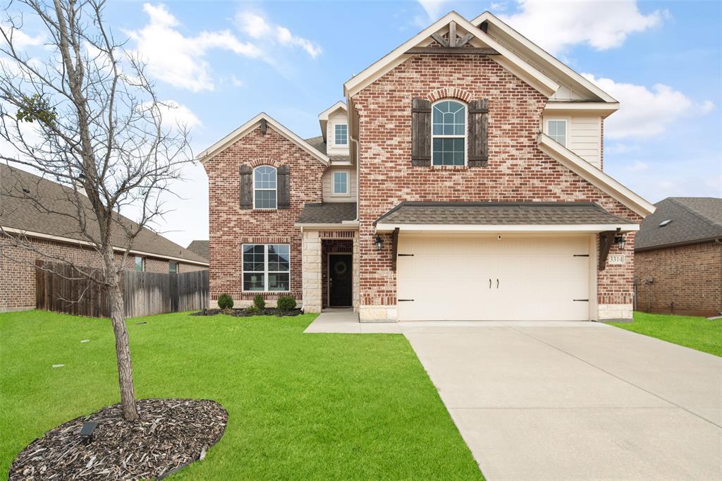3314 Greymoore Drive Anna, TX 75409 - Photo 1 of 1 a front view of a house with garden