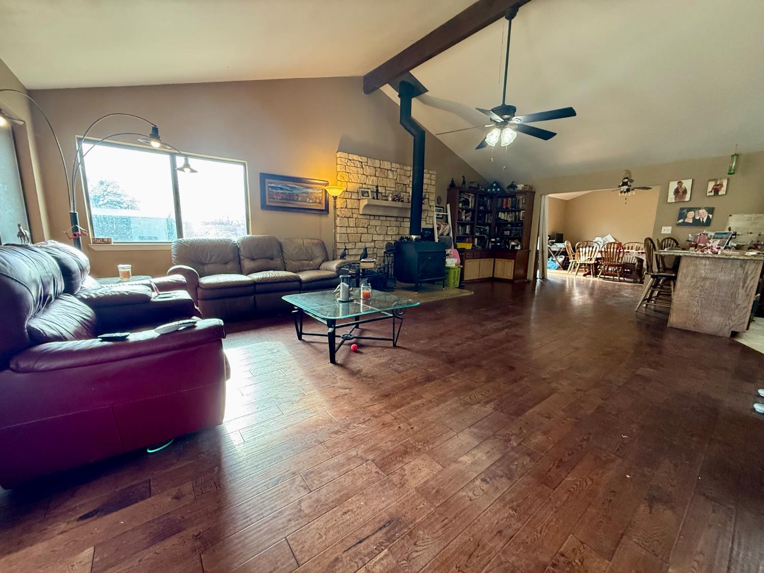 3536 Burson Road Valley Springs, CA 95252 - Photo 11 of 91 a living room with fireplace furniture and a large window