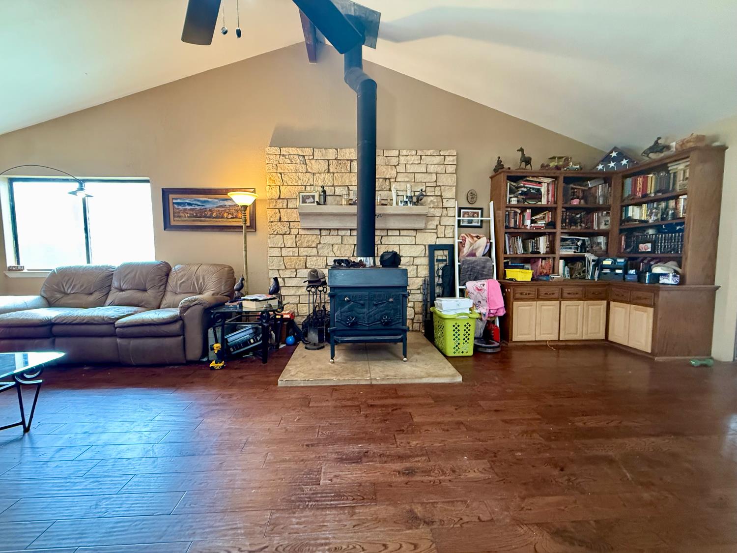 3536 Burson Road Valley Springs, CA 95252 - Photo 14 of 91 a living room with furniture and a book shelf