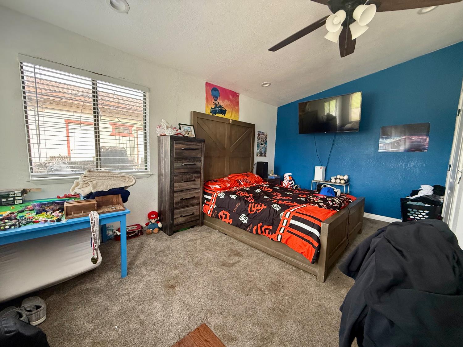 3536 Burson Road Valley Springs, CA 95252 - Photo 27 of 91 a bedroom with bed and a tv