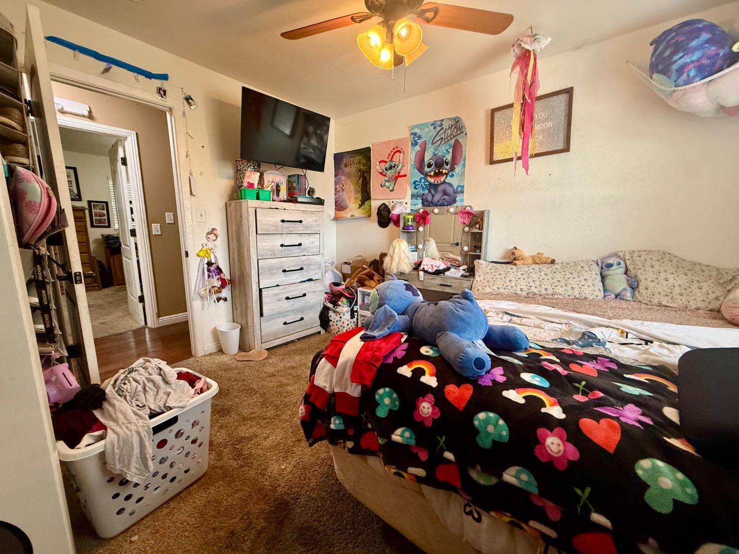 3536 Burson Road Valley Springs, CA 95252 - Photo 38 of 91 a bedroom with a bed closet and flat screen tv