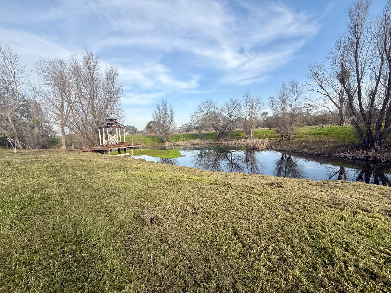 3536 Burson Road Valley Springs, CA 95252 - Photo 68 of 91 a view of a lake with houses in the background