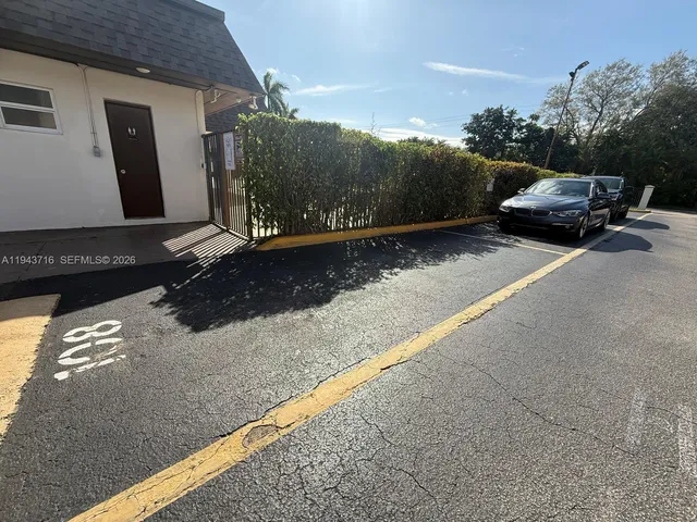 a view of a street with cars