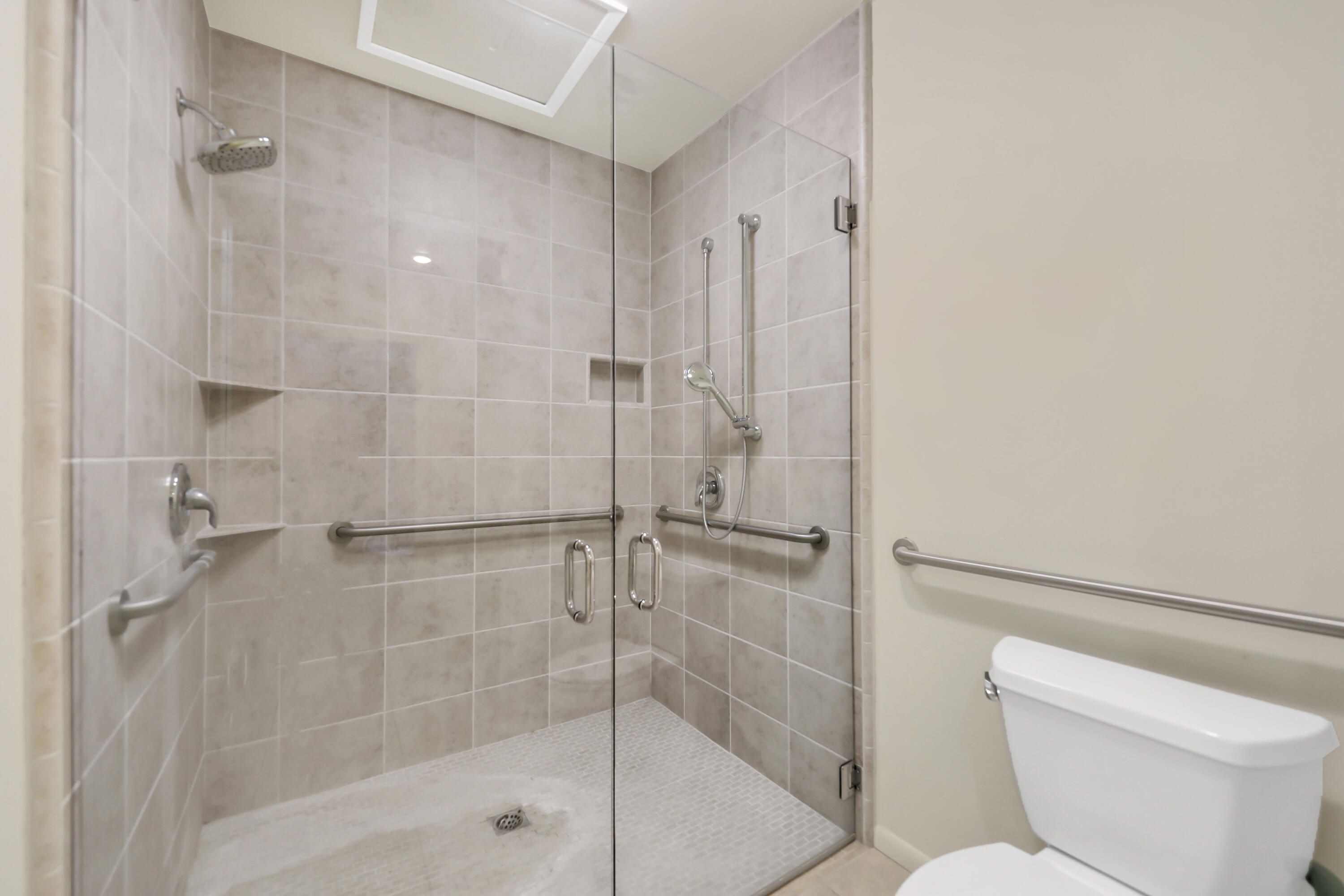 770 South La Mirada Road Palm Springs, CA 92264 - Photo 12 of 39 a bathroom with a shower and toilet
