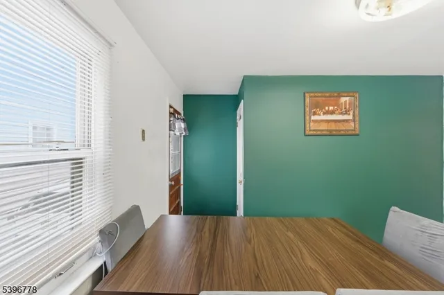 a view of kitchen with wooden floor