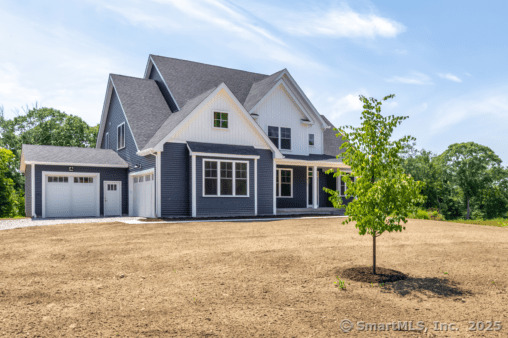 18 Twin Valley Road East Lyme, CT 06333 - Photo 1 of 26 a front view of a house with a yard and garage