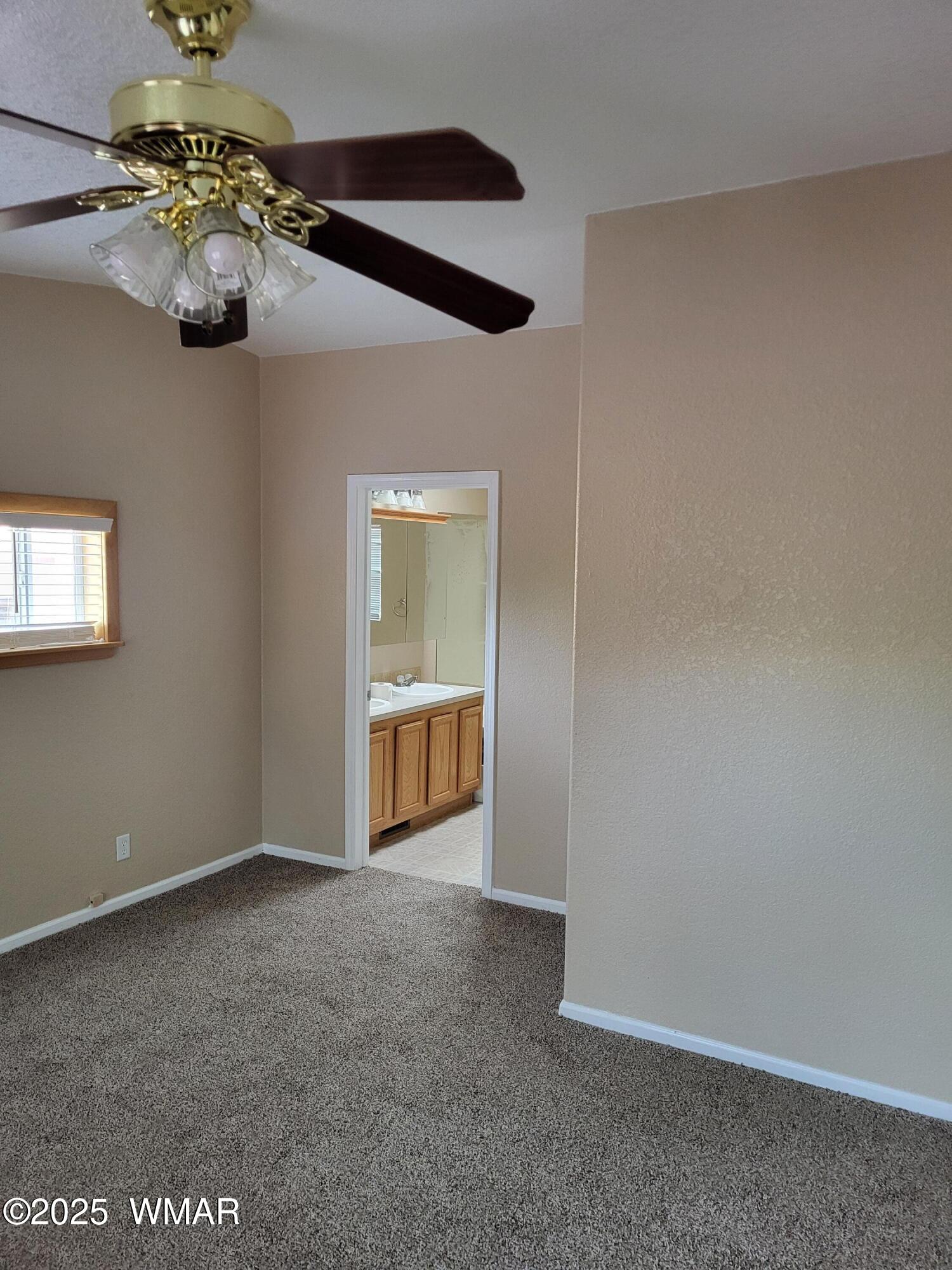 2052 Lone Mountain Road Overgaard, AZ 85933 - Photo 8 of 24 a view of an empty room