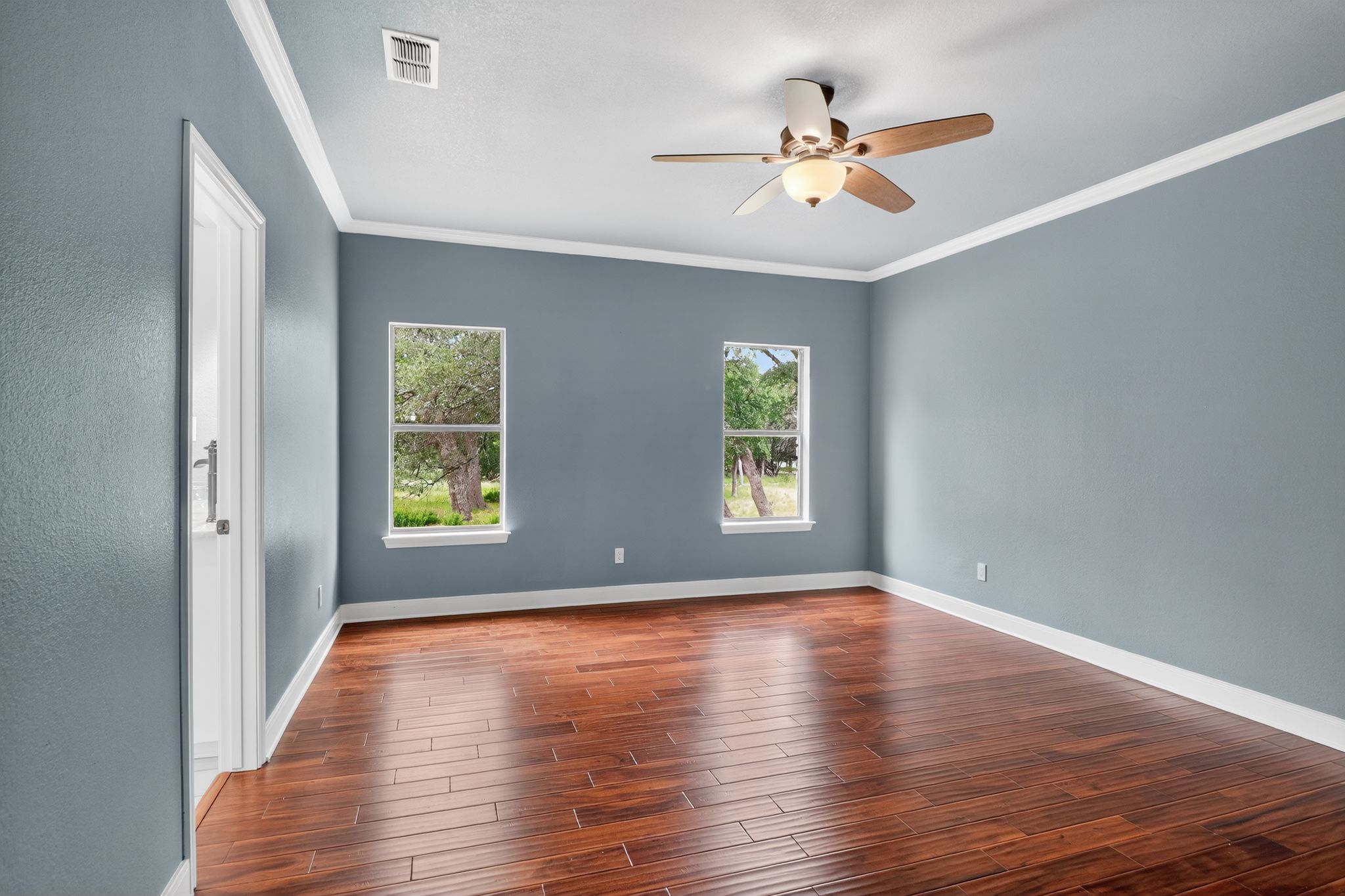 128 Mockingbird Lane Georgetown, TX 78633 - Photo 13 of 32 Primary Bedroom with Views of Private Lot