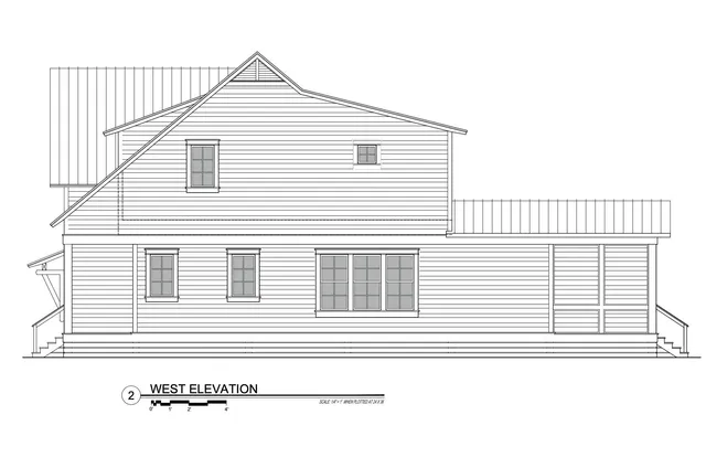 a white house that has a car windows