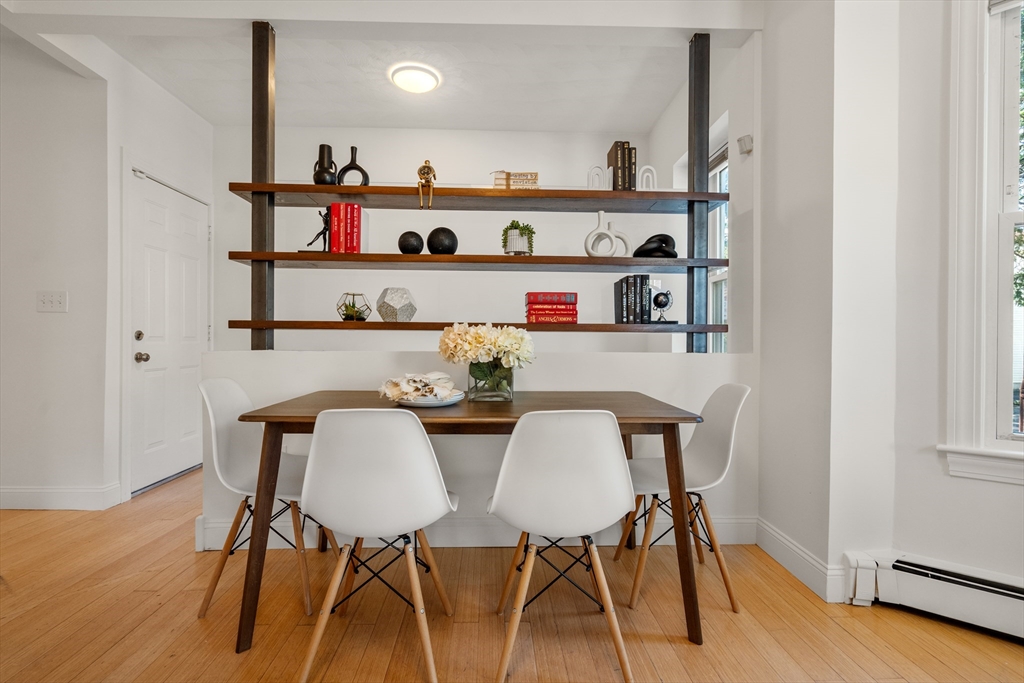 30 Union Street, Unit 1 Cambridge, MA 02141 - Photo 3 of 17 a dining room with furniture and wooden floor