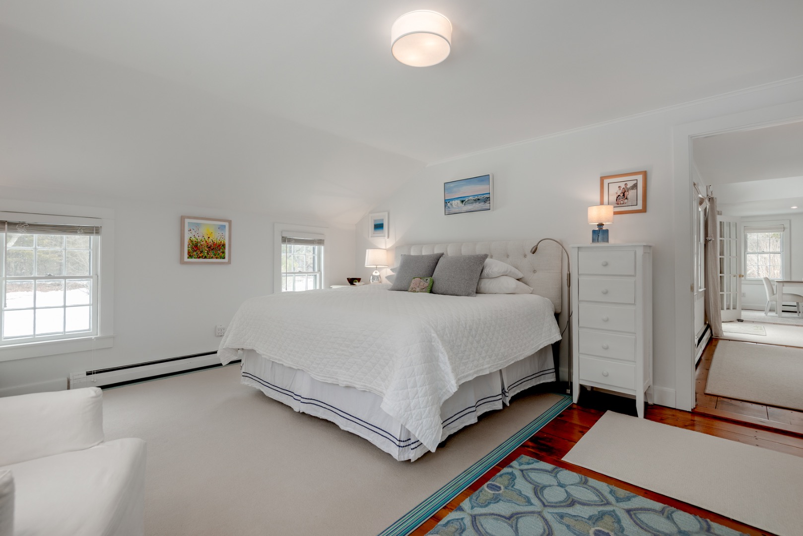 11 Sesapana Road Nantucket, MA 02554 - Photo 16 of 37 a bedroom with a bed and a flat screen tv