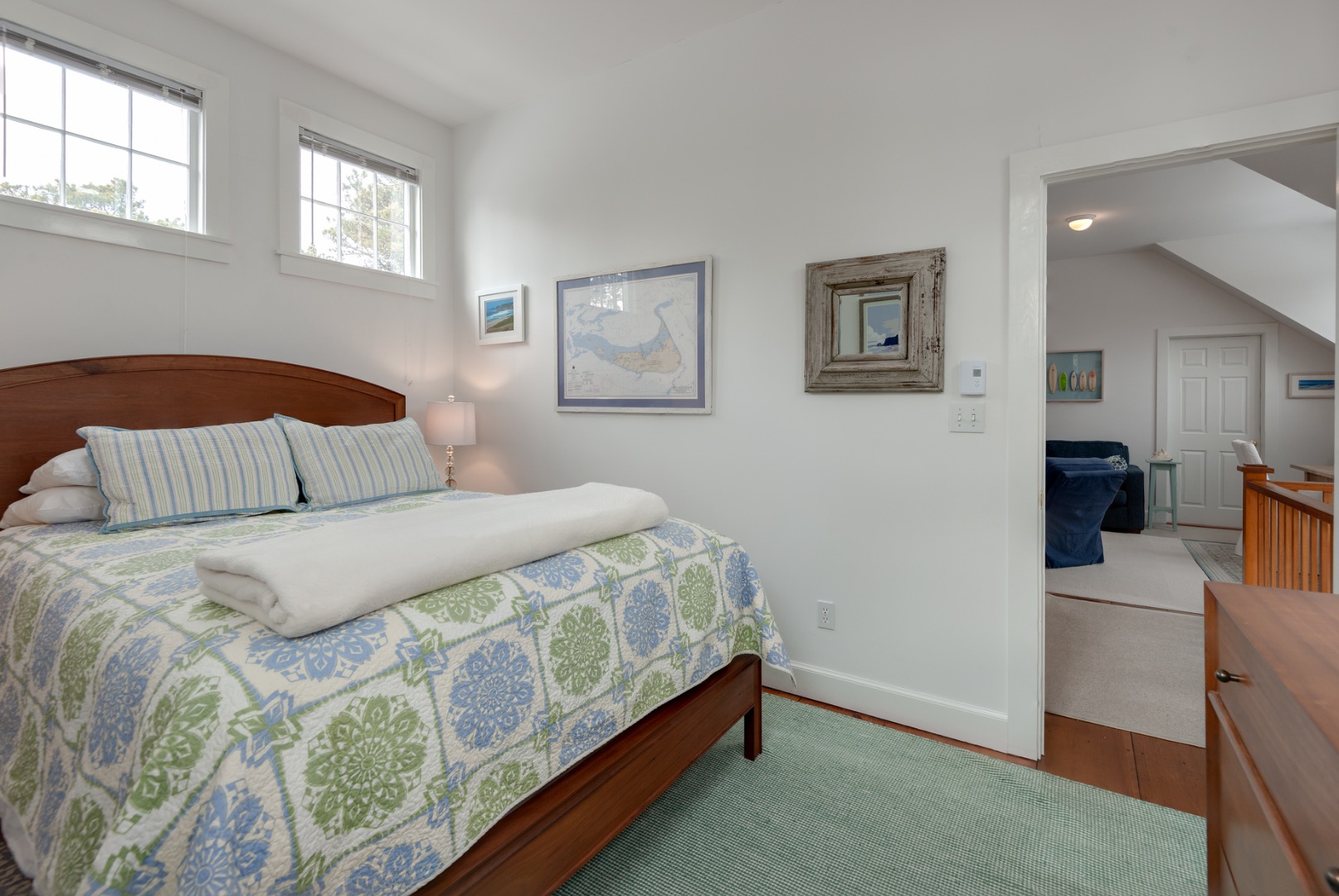 11 Sesapana Road Nantucket, MA 02554 - Photo 26 of 37 a bedroom with a bed and a view of kitchen
