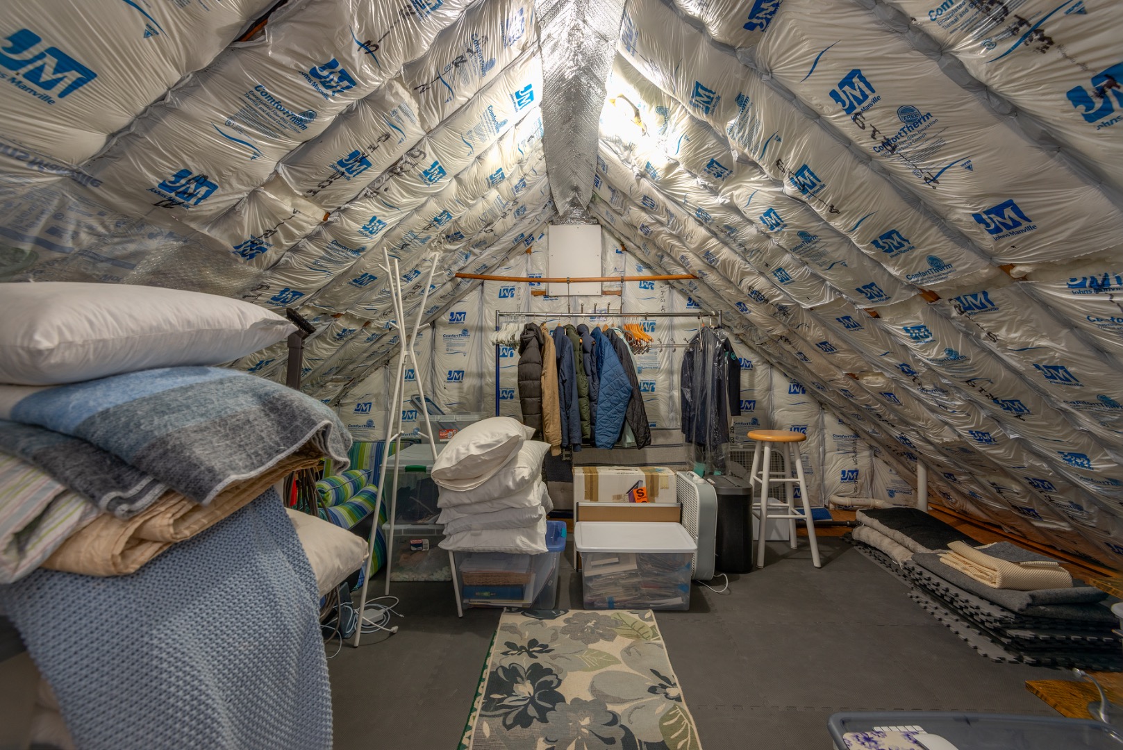 11 Sesapana Road Nantucket, MA 02554 - Photo 27 of 37 a living room with furniture and a chandelier