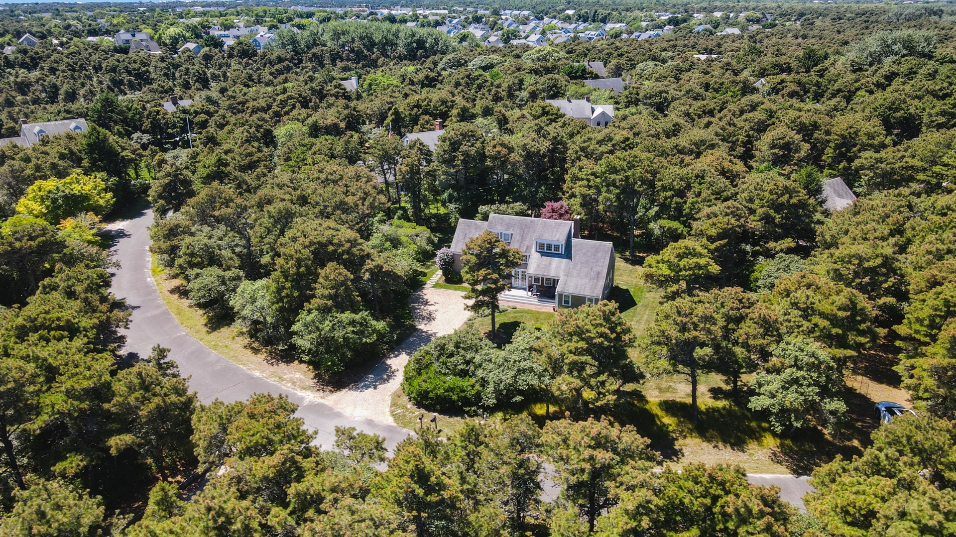 11 Sesapana Road Nantucket, MA 02554 - Photo 33 of 37 an aerial view of residential house with outdoor space and trees all around