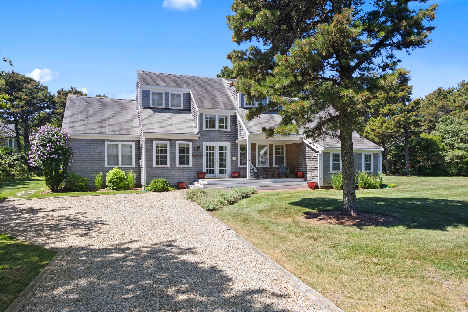 11 Sesapana Road Nantucket, MA 02554 - Photo 37 of 37 a front view of a house with a yard