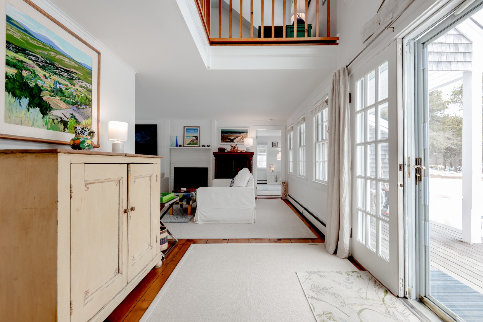 11 Sesapana Road Nantucket, MA 02554 - Photo 5 of 37 a living room with furniture a fireplace and a large window