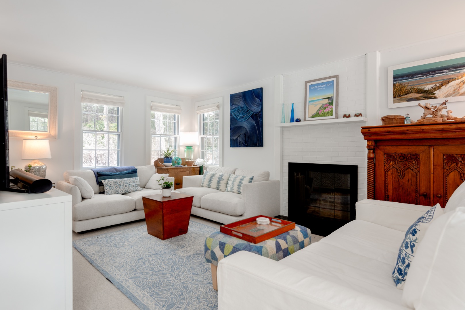 11 Sesapana Road Nantucket, MA 02554 - Photo 7 of 37 a living room with furniture and a fireplace