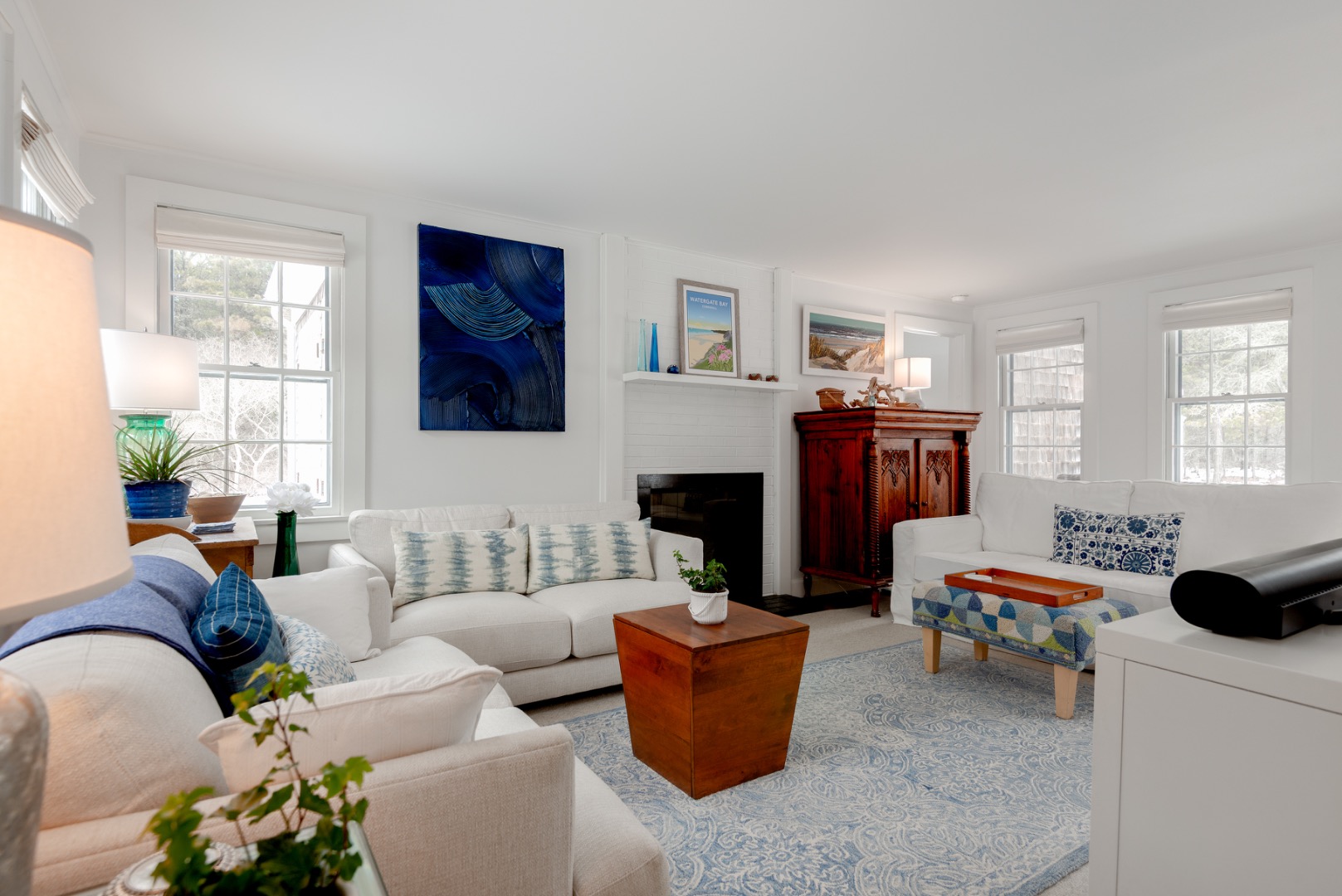 11 Sesapana Road Nantucket, MA 02554 - Photo 9 of 37 a living room with furniture and a fireplace
