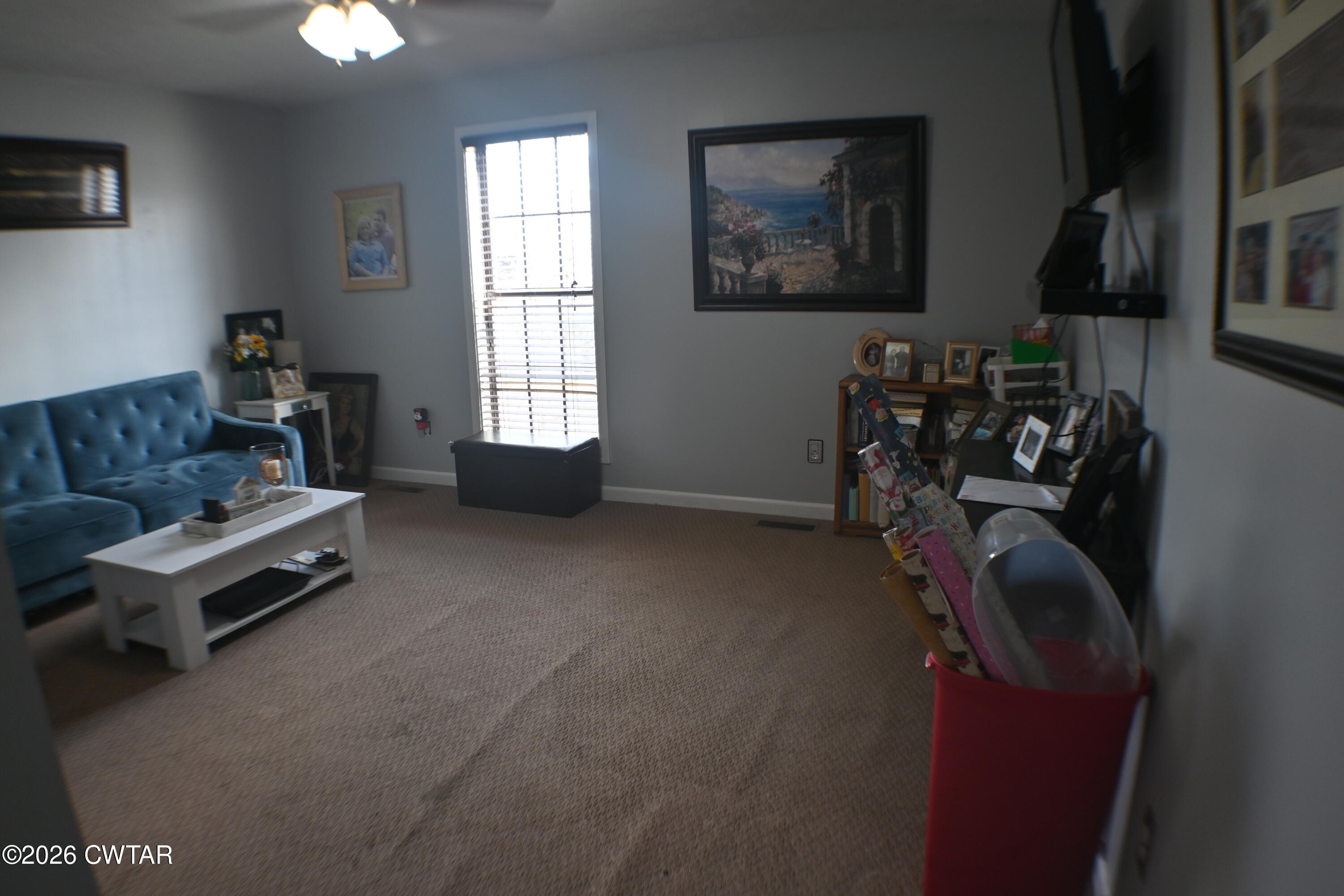 233 South Front Street Halls, TN 38040 - Photo 12 of 23 a living room with furniture and a window