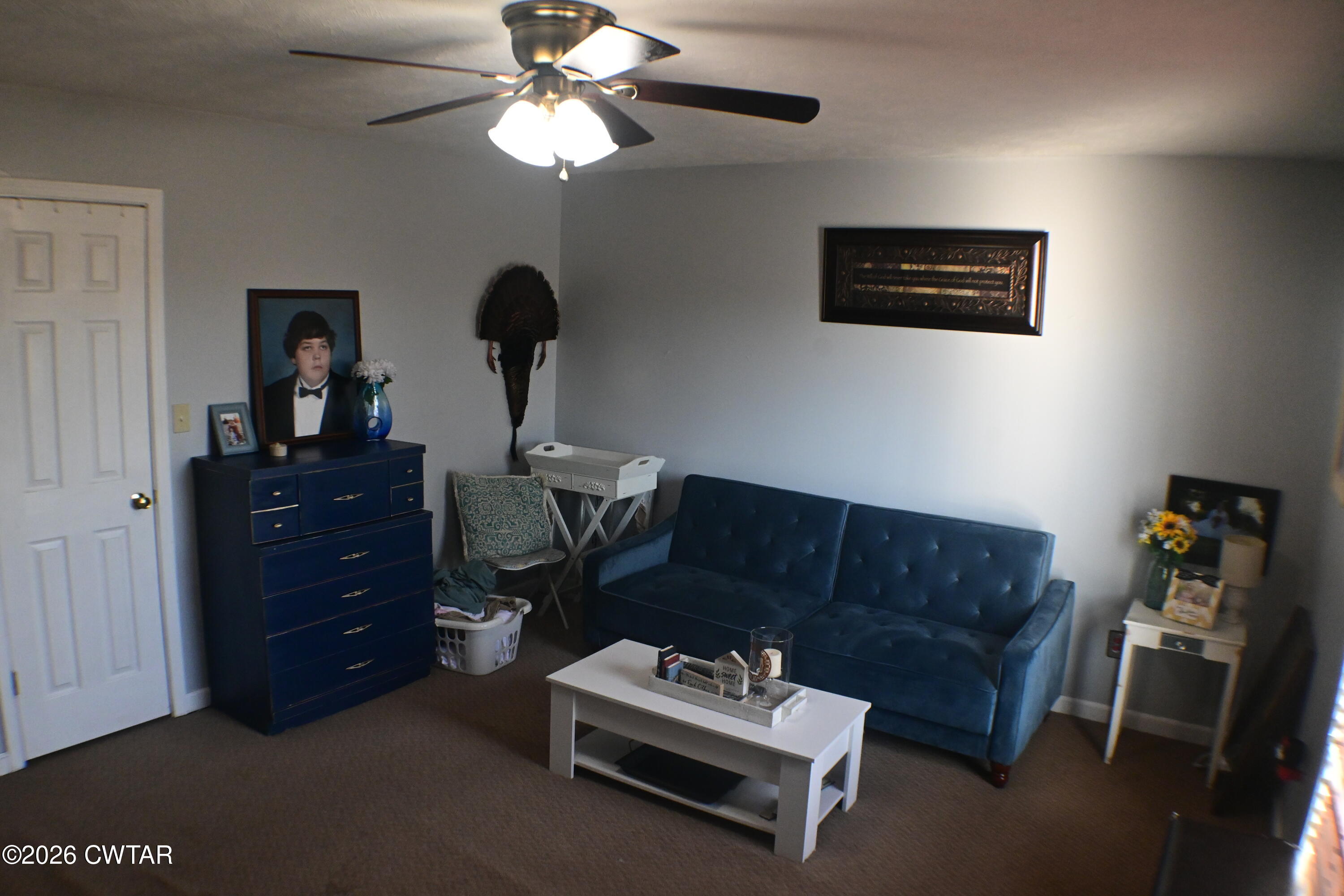 233 South Front Street Halls, TN 38040 - Photo 13 of 23 a living room with furniture and a window