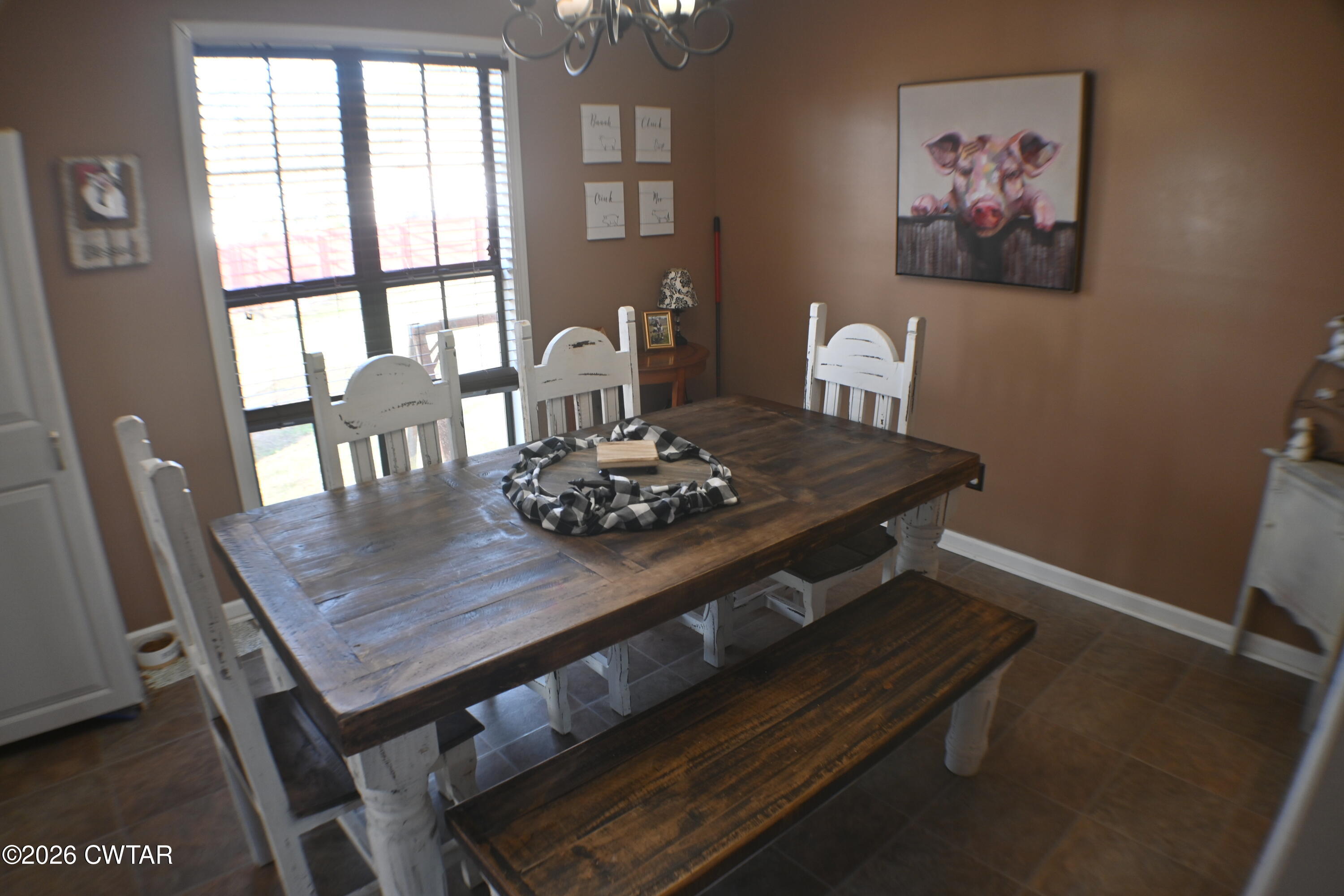 233 South Front Street Halls, TN 38040 - Photo 14 of 23 a view of a dining room with furniture window and wooden floor