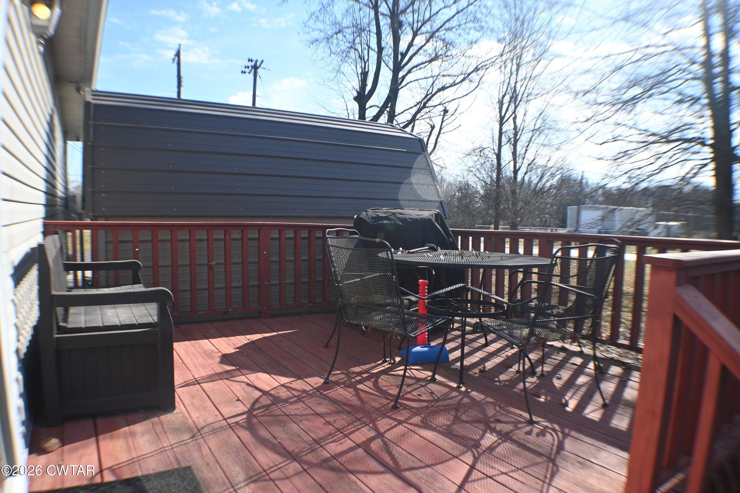 233 South Front Street Halls, TN 38040 - Photo 17 of 23 a view of a chairs and table on the deck