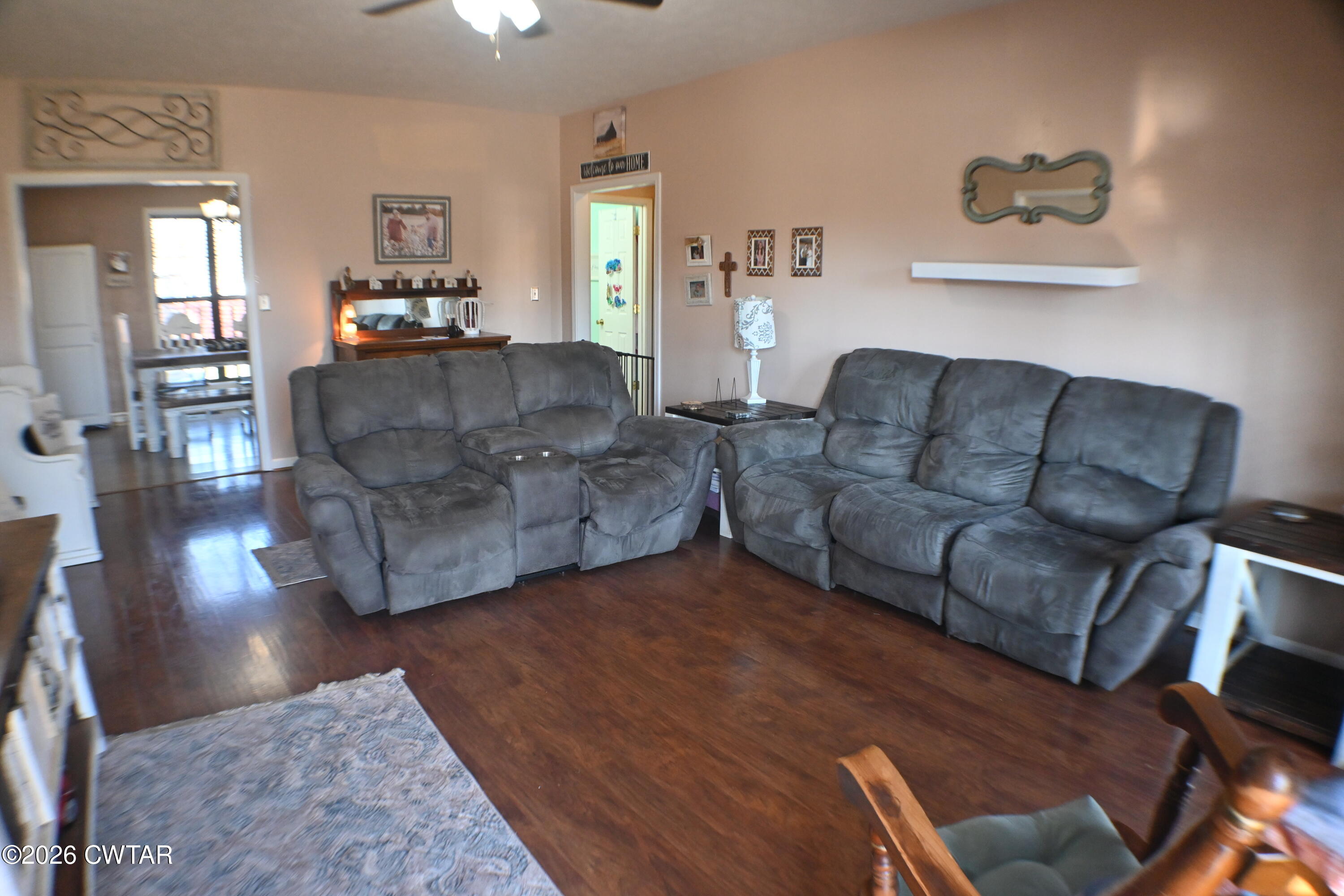 233 South Front Street Halls, TN 38040 - Photo 5 of 23 a living room with furniture and a wooden floor