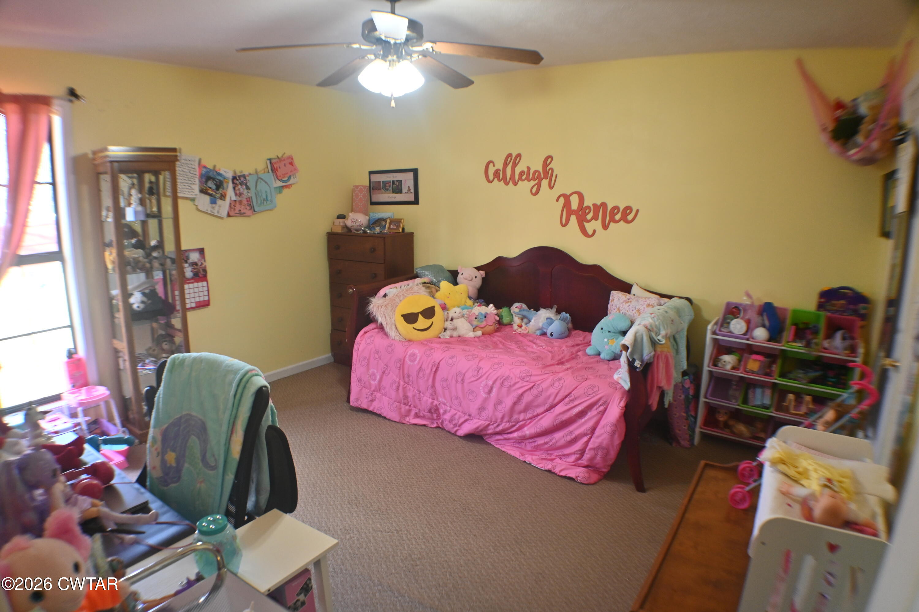 233 South Front Street Halls, TN 38040 - Photo 9 of 23 a bedroom with furniture and a wooden floor