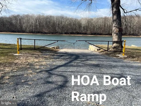 a view of a park with iron fence