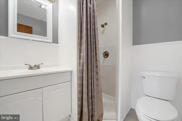 a view of walk in closet with window