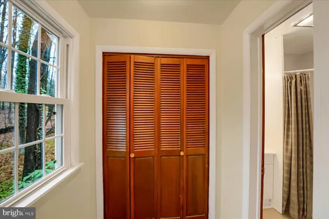 a bathroom with a toilet a sink and a bath tub
