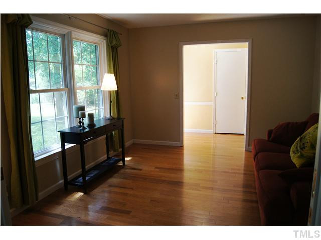 5822 Newhall Road Durham, NC 27713 - Photo 14 of 25 Home features Hardwood Floors in the Formal Living Room, Dining Room, Family Room and Hallway. Living Room