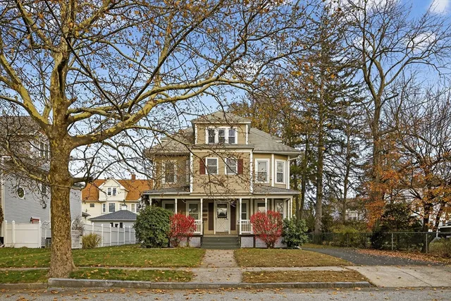 front view of residential houses with yard