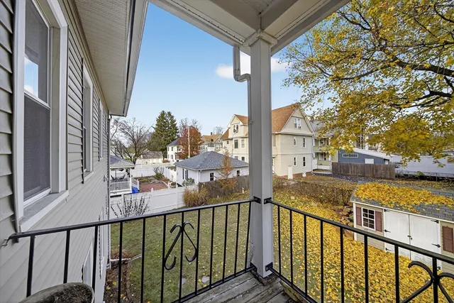 a view of a balcony with city view