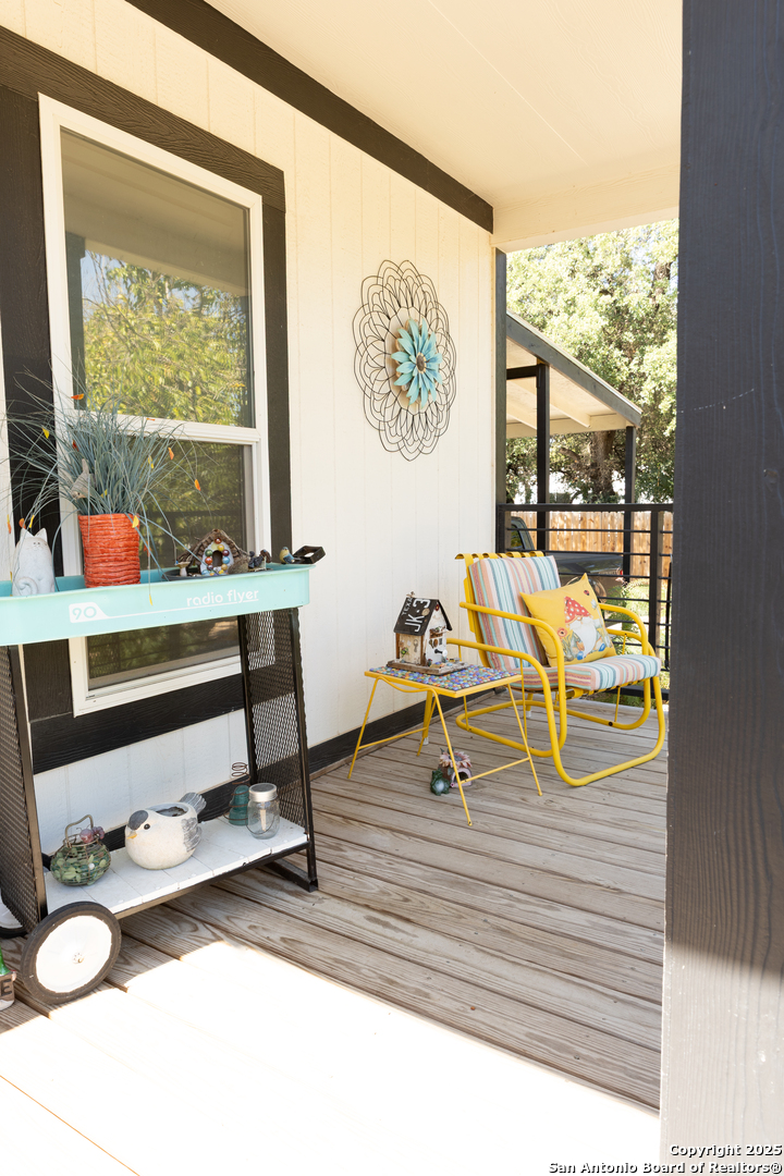 118 Flatrock Lane Junction, TX 76849 - Photo 14 of 18 a living room with a table and a large window