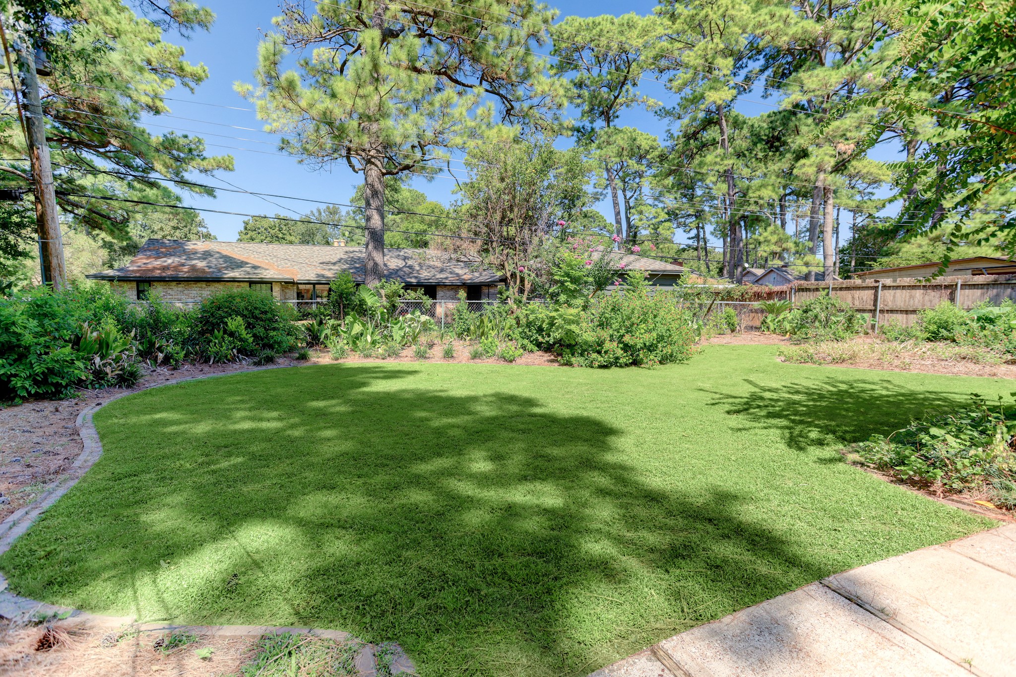 10226 Ivyridge Road Houston, TX 77043 - Photo 22 of 37 a view of yard with green space